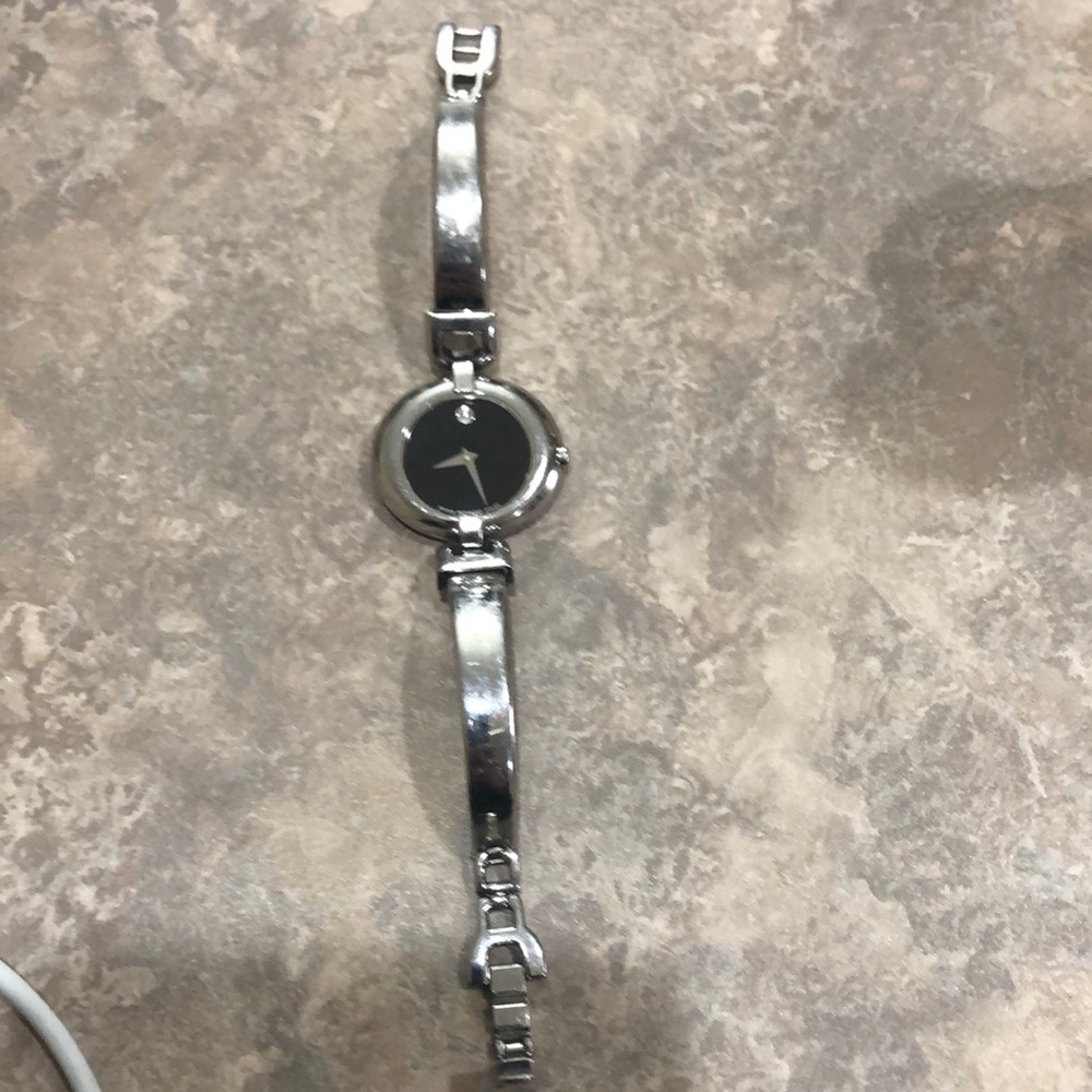 Movada black dial watch